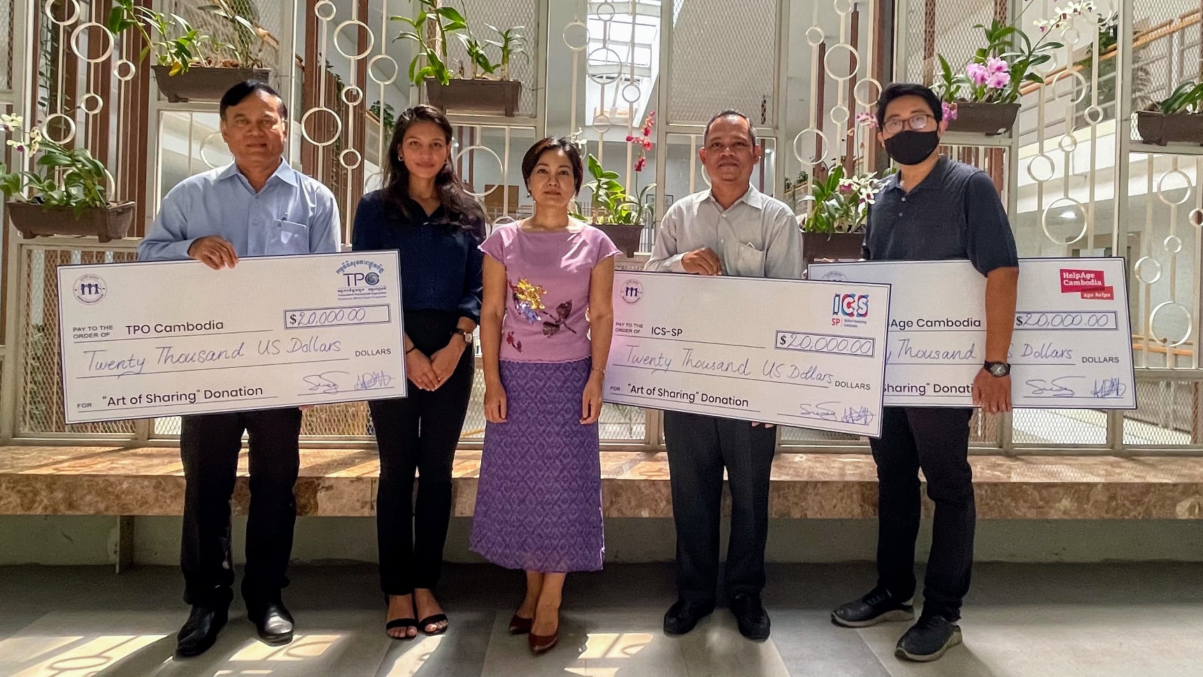 H.E. Chea Serey handed $60,000 raised by ‘The Art of Sharing’ to 3 NGOs